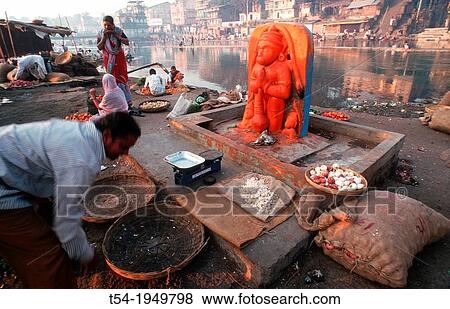 Man brings offerings to Hanuman Schrain in Nasik - India View Large Photo Image Stock Photo - Man brings offerings to Hanuman Schrain in Nasik - India. Fotosearch
