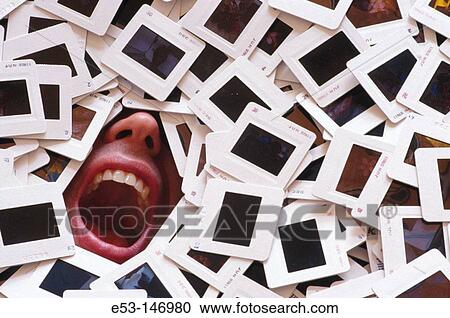 Man buried under a pile of 35 mm slides View Large Photo Image Stock Image - Man buried under a pile of 35 mm slides. Fotosearch