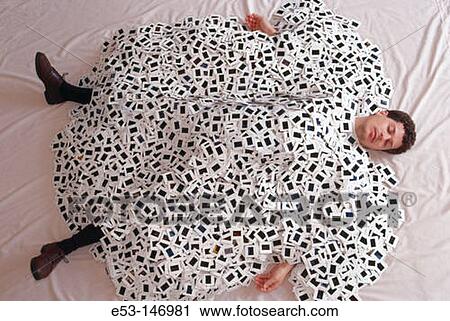 Man buried under a pile of 35 mm slides View Large Photo Image Stock Image - Man buried under a pile of 35 mm slides. Fotosearch