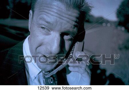 Man calling for road help View Large Photo Image Stock Photo - Man calling for road help. Fotosearch