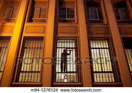 man cleaning a window View Large Photo Image Picture - man cleaning a window. Fotosearch