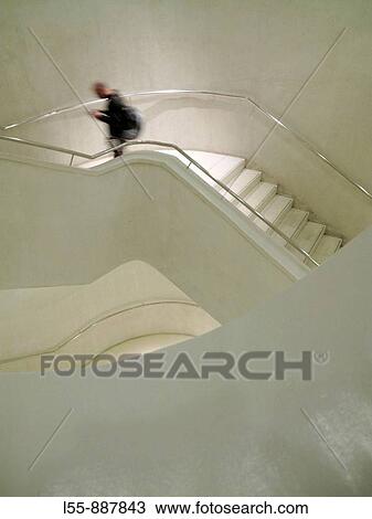 Man climbing stairs View Large Photo Image Stock Image - Man climbing stairs. Fotosearch