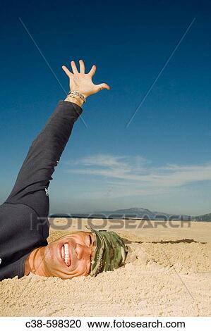 Man Coming Out of a Ditch View Large Photo Image Stock Image - Man Coming Out of a Ditch. Fotosearch