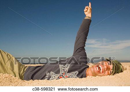 Man Coming Out of a Ditch View Large Photo Image Stock Image - Man Coming Out of a Ditch. Fotosearch