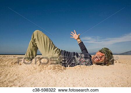 Man Coming Out of a Ditch View Large Photo Image Stock Image - Man Coming Out of a Ditch. Fotosearch