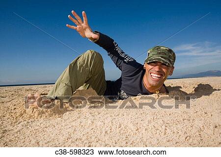 Man Coming Out of a Ditch View Large Photo Image Stock Image - Man Coming Out of a Ditch. Fotosearch