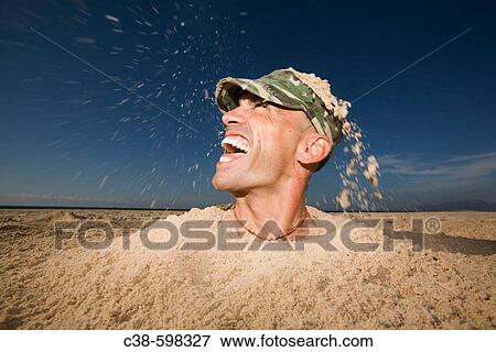 Man Coming Out of a Ditch View Large Photo Image Stock Photo - Man Coming Out of a Ditch. Fotosearch