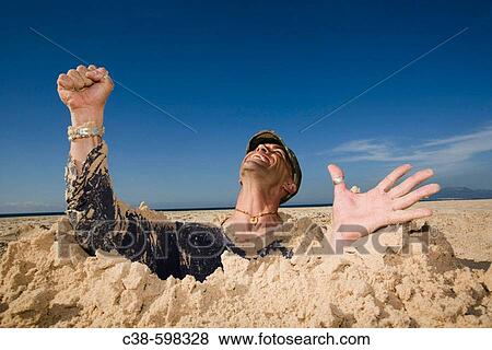 Man Coming Out of a Ditch View Large Photo Image Stock Photo - Man Coming Out of a Ditch. Fotosearch