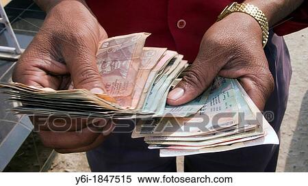 Man counting Indian rupee notes India View Large Photo Image Stock Photography - Man counting Indian rupee notes India. Fotosearch