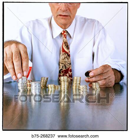 Man counting money View Large Photo Image Stock Photo - Man counting money. Fotosearch