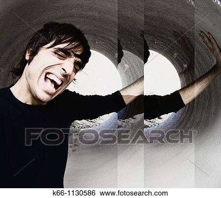 Man crying in a tube View Large Photo Image Stock Photograph - Man crying in a tube. Fotosearch