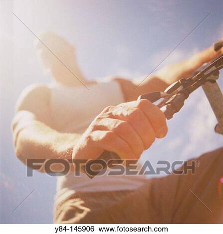 Man cycling View Large Photo Image Stock Photograph - Man cycling. Fotosearch