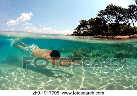Man diving, Cleopatra island Sedir Island, Aegean Sea, Turkey, View Large Photo Image Stock Photography - Man diving, Cleopatra island Sedir Island, Aegean Sea, Turkey,. Fotosearch