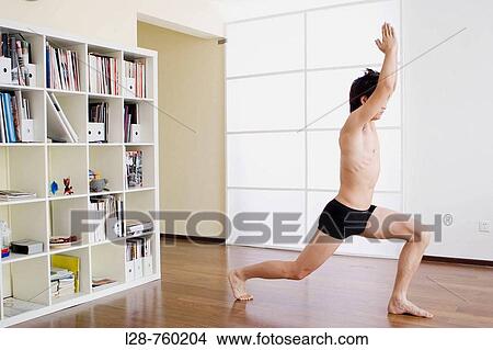 man doing yoga exercise View Large Photo Image Picture - man doing yoga exercise. Fotosearch