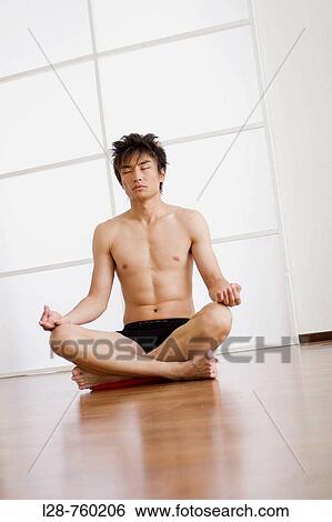 man doing yoga exercise View Large Photo Image Stock Photograph - man doing yoga exercise. Fotosearch