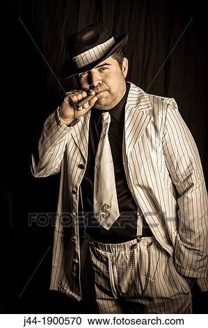 Man dressed with 1920s costume in a party View Large Photo Image Stock Image - Man dressed with 1920s costume in a party. Fotosearch