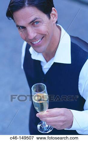 Man drinking champagne View Large Photo Image Stock Photo - Man drinking champagne. Fotosearch