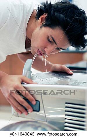 man drinking View Large Photo Image Stock Image - man drinking. Fotosearch