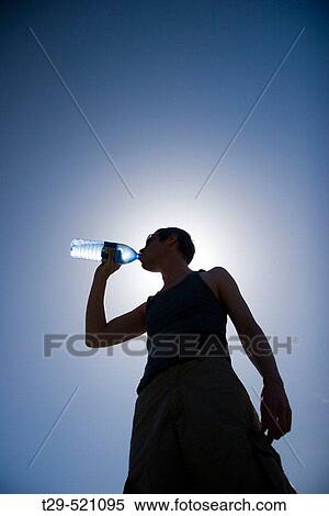 Man drinking water View Large Photo Image Stock Photography - Man drinking water. Fotosearch