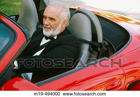 man driving a red convertible View Large Photo Image Stock Image - man driving a red convertible. Fotosearch