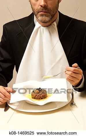 Stock Photography - Man eating. Fotosearch