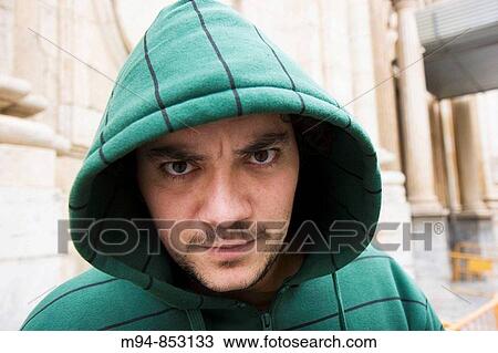 Man facing camera, serious View Large Photo Image Stock Image - Man facing camera, serious. Fotosearch