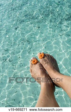 Man feet at Indian Ocean, Maldives View Large Photo Image Stock Image - Man feet at Indian Ocean, Maldives. Fotosearch