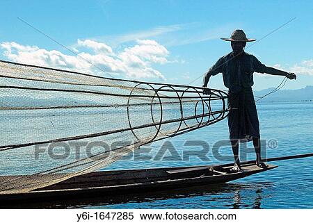 Man fishing at Inle Lake in Burma Myanmar View Large Photo Image Stock Photography - Man fishing at Inle Lake in Burma Myanmar. Fotosearch