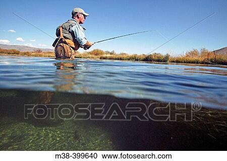 Man fly fishing. Silver Creek, Idaho. USA View Large Photo Image Stock Image - Man fly fishing. Silver Creek, Idaho. USA. Fotosearch