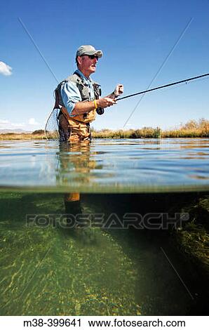 Man fly fishing. Silver Creek, Idaho. USA View Large Photo Image Stock Image - Man fly fishing. Silver Creek, Idaho. USA. Fotosearch