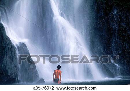 Man. Git Git waterfall. Bali. Indonesia. View Large Photo Image Stock Image - Man. Git Git waterfall. Bali. Indonesia.. Fotosearch
