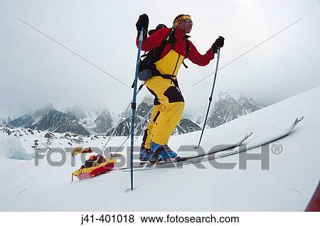 Man hauling sledges towards K2, Baltoro glacier. Karakoram mountains, Pakistan View Large Photo Image Stock Photo - Man hauling sledges towards K2, Baltoro glacier. Karakoram mountains, Pakistan. Fotosearch