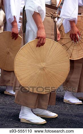 Man holding a flat woven straw hat in the Jidai Matsuri. Kyoto city. Kyoto. Japan. View Large Photo Image Stock Image - Man holding a flat woven straw hat in the Jidai Matsuri. Kyoto city. Kyoto. Japan.. Fotosearch