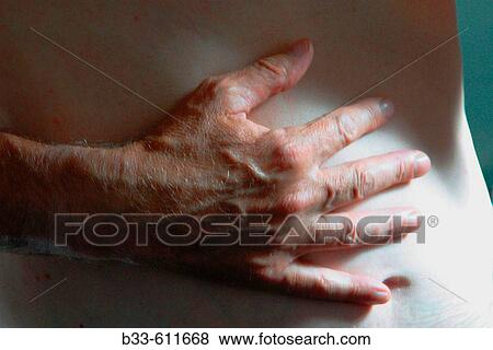 Man holding stomach View Large Photo Image Stock Photo - Man holding stomach. Fotosearch