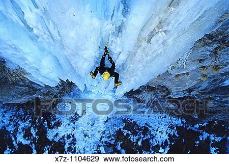 Man, ice climbing a route called Neutron at the Mother Lode Area in the Snake River Canyon near the city of Twin Falls, Idaho View Large Photo Image Stock Photo - Man, ice climbing a route called Neutron at the Mother Lode Area in the Snake River Canyon near the city of Twin Falls, Idaho. Fotosearch