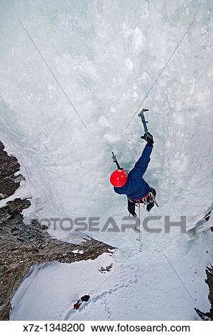 Man ice climbing a route which is rated WI4 near Silver Creek high in the Boulder Mountains in central Idaho View Large Photo Image Stock Image - Man ice climbing a route which is rated WI4 near Silver Creek high in the Boulder Mountains in central Idaho. Fotosearch