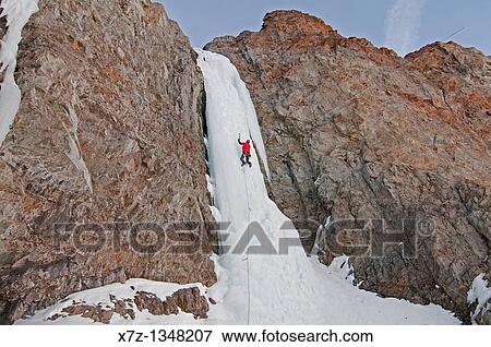 Man ice climbing a route which is rated WI4 near Silver Creek high in the Boulder Mountains in central Idaho View Large Photo Image Stock Photo - Man ice climbing a route which is rated WI4 near Silver Creek high in the Boulder Mountains in central Idaho. Fotosearch