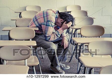 Man in a college classroom View Large Photo Image Stock Photo - Man in a college classroom. Fotosearch
