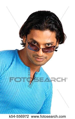 Man in a sky blue T-shirt waring sunglasses. View Large Photo Image Stock Image - Man in a sky blue T-shirt waring sunglasses.. Fotosearch