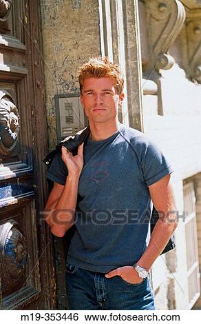 Stock Photograph - man in a T shirt. Fotosearch