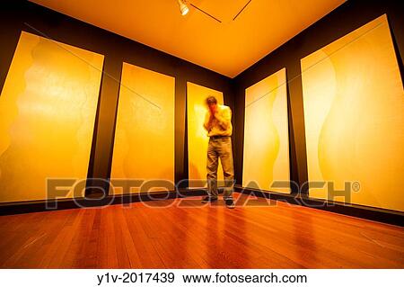 Man in an empty room in an office building. View Large Photo Image Stock Photo - Man in an empty room in an office building.. Fotosearch