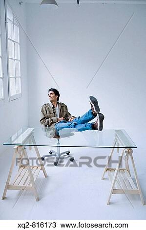 Man in empty office View Large Photo Image Stock Image - Man in empty office. Fotosearch