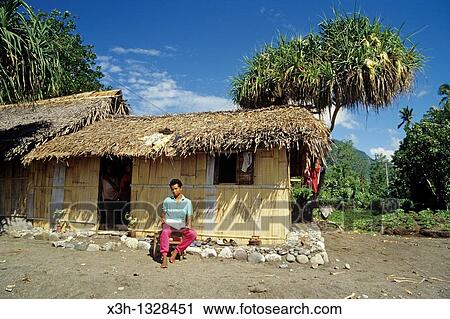 man in front of his house, Flores island, Lesser Sunda Islands, Republic of Indonesia, Southeast Asia and Oceania View Large Photo Image Stock Image - man in front of his house, Flores island, Lesser Sunda Islands, Republic of Indonesia, Southeast Asia and Oceania. Fotosearch