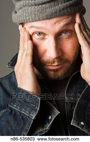 Stock Image - Man in hat, fashion. Fotosearch