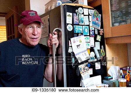 Man in kitchen View Large Photo Image Stock Image - Man in kitchen. Fotosearch