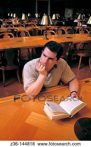 Man in library View Large Photo Image Stock Photo - Man in library. Fotosearch
