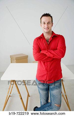 Man in new home View Large Photo Image Stock Photo - Man in new home. Fotosearch