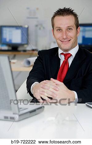 Man in office View Large Photo Image Stock Image - Man in office. Fotosearch