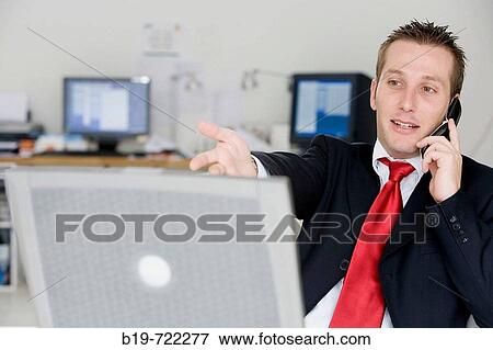 Man in office View Large Photo Image Stock Photo - Man in office. Fotosearch