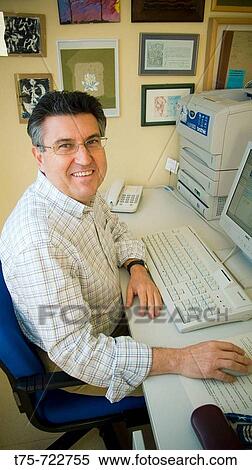 Stock Photography - Man in office. Fotosearch